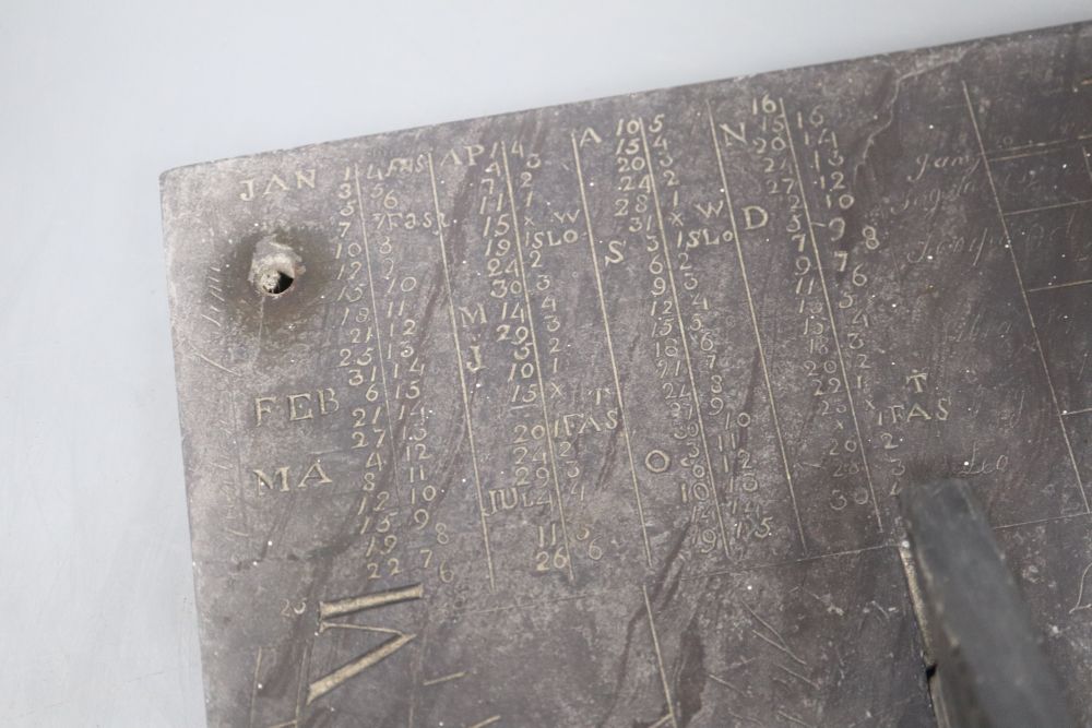 An 18th century slate sundial bearing solar calculations